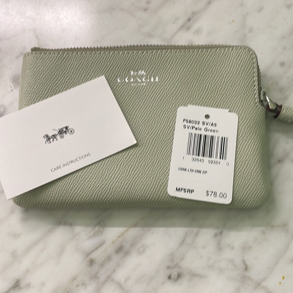 Coach wristlet in a light green color. - Picture 3 of 3